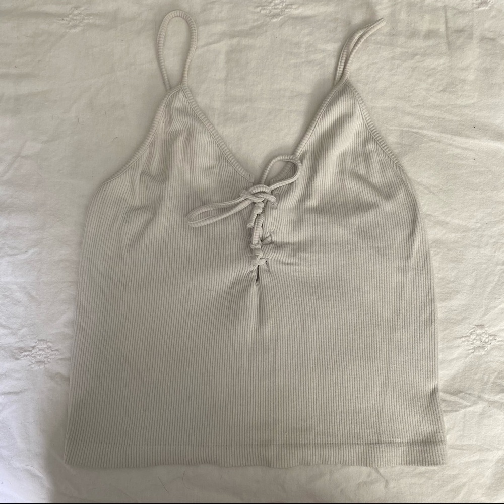 White ripped tank top